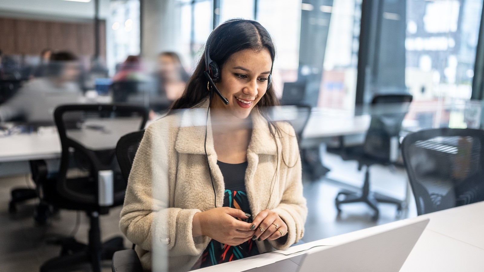 Young woman working in call centre