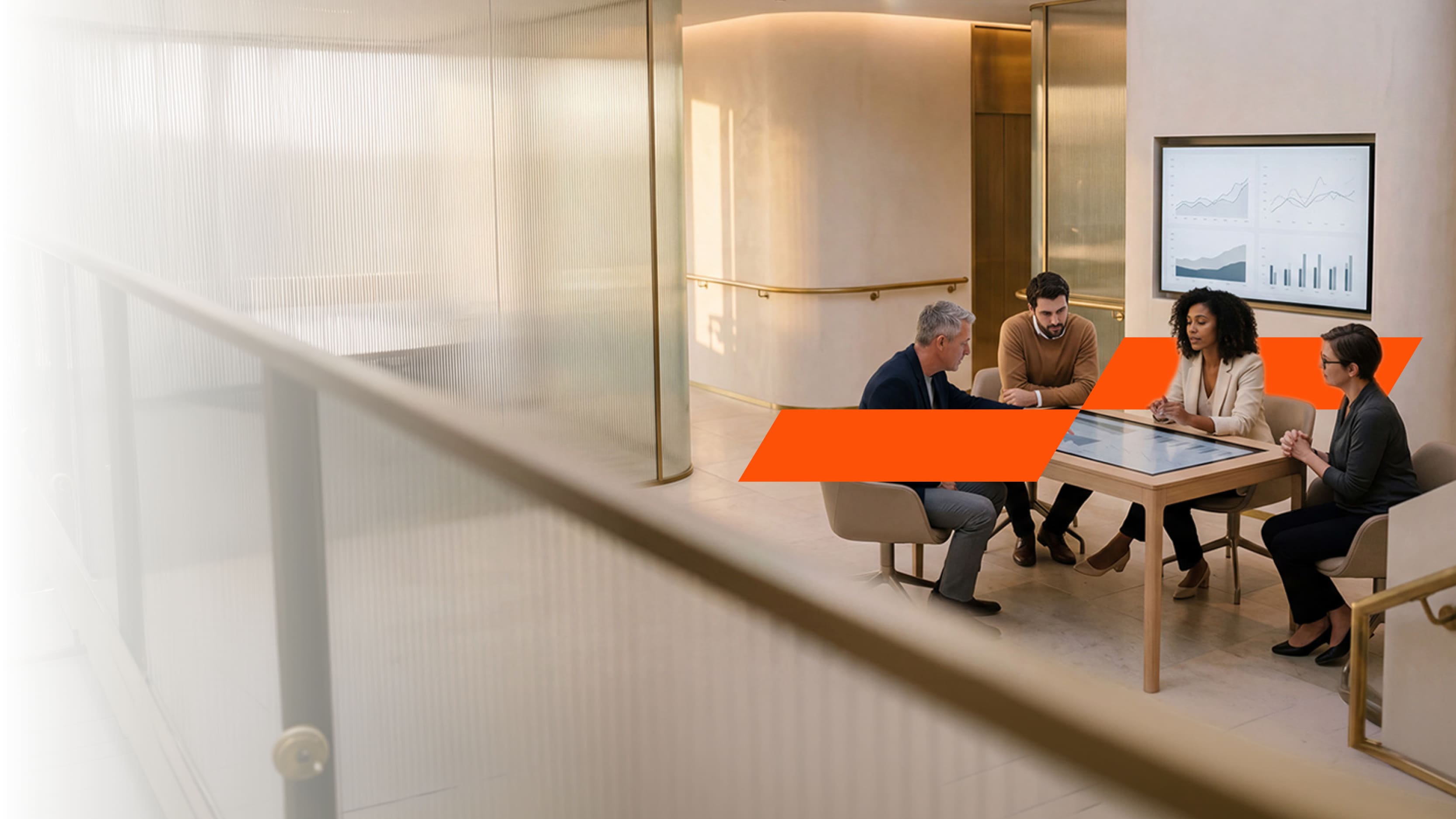 A group of co-working working on a digital screen