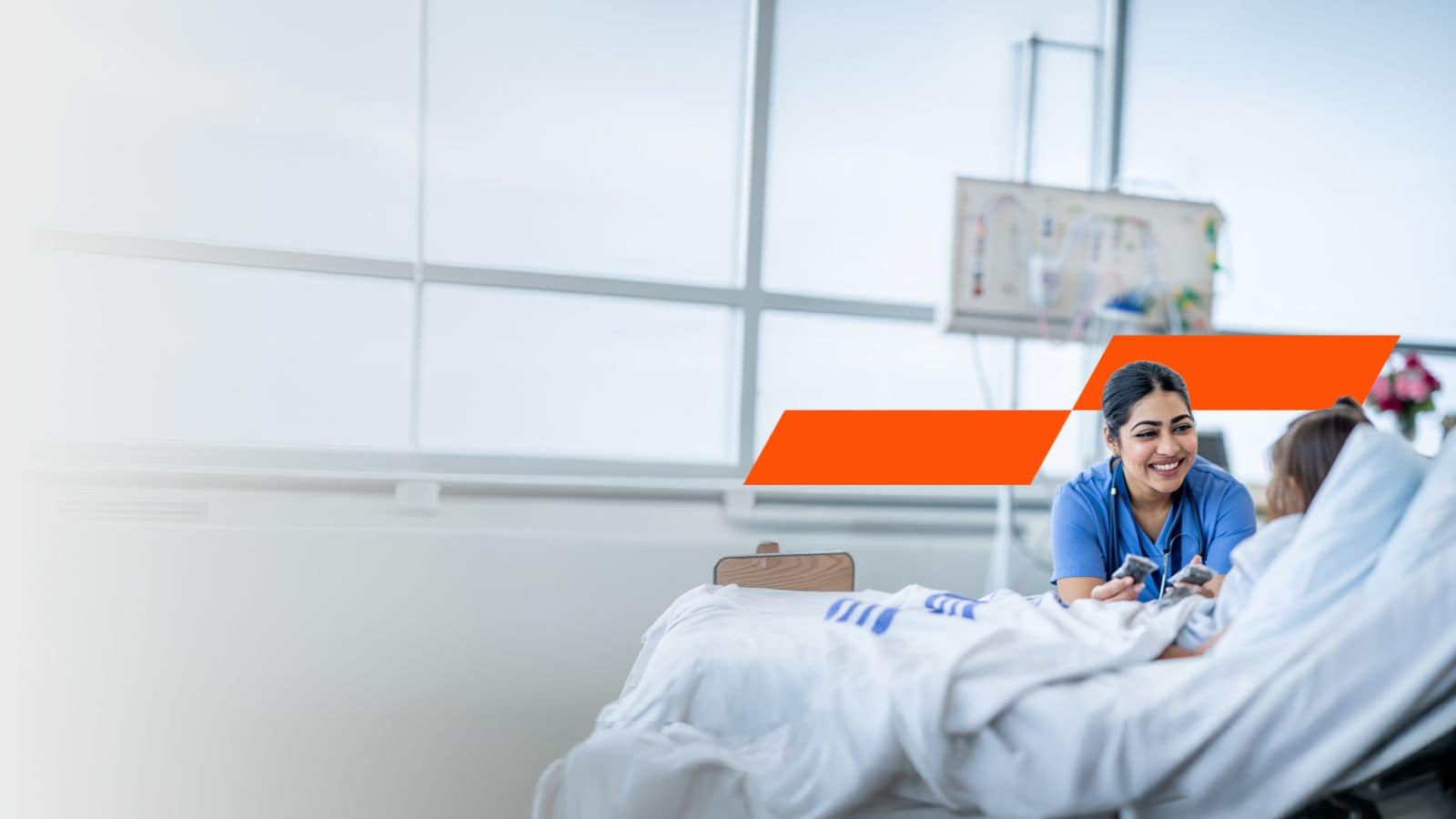 Nurse looking after young patient and momentum mark behind them